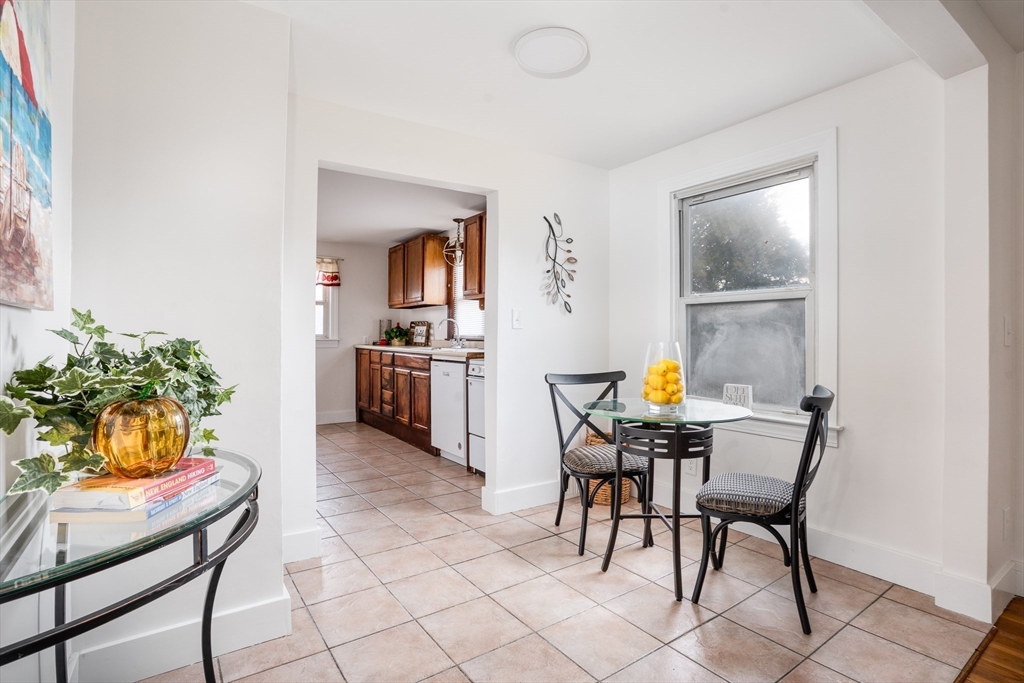 142 Amherst Street Ludlow, MA 01056 - Photo 7 of 34 a view of a dining room with furniture and a window