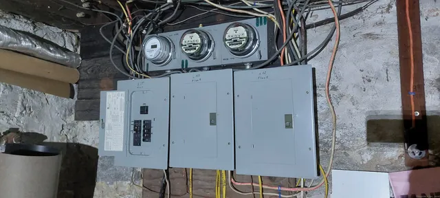 a bathroom with a refrigerator and a stove