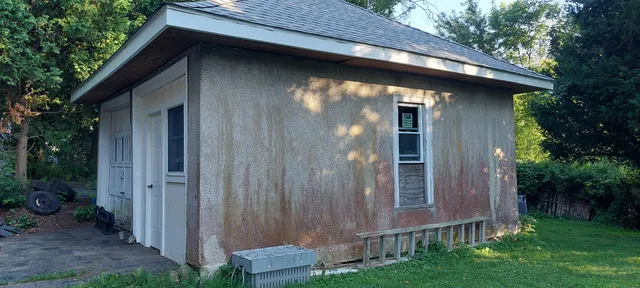 a backyard of a house with lots of green space