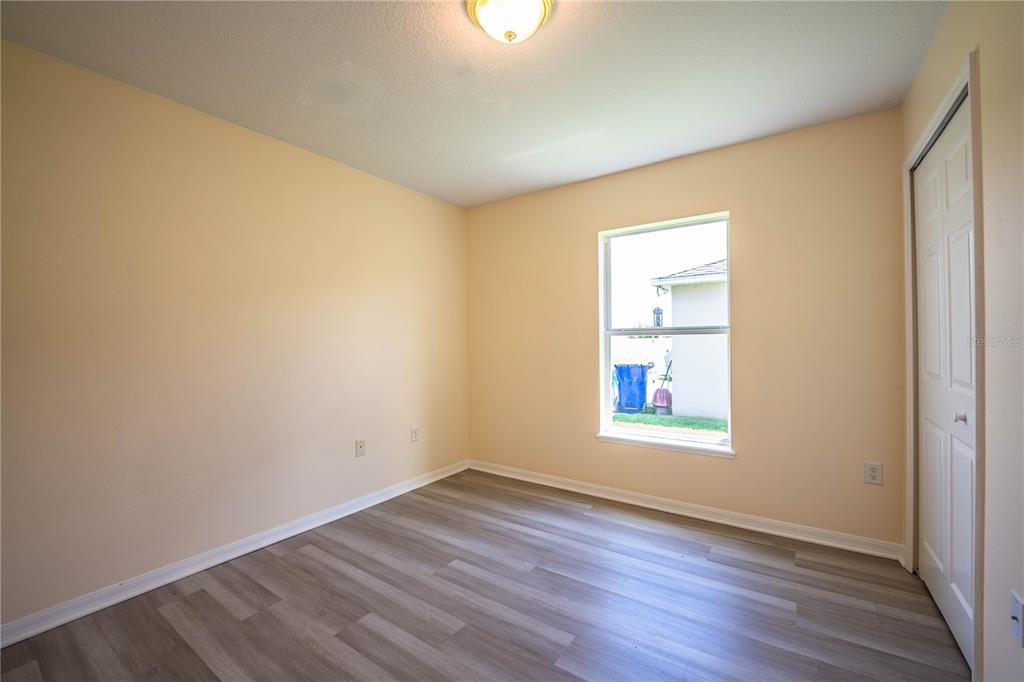 241 Grove Branch Road Winter Haven, FL 33880 - Photo 21 of 31 an empty room with a window