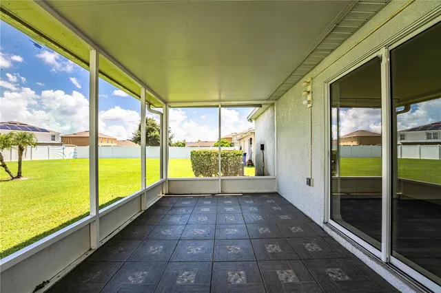 a view of a house with a big yard