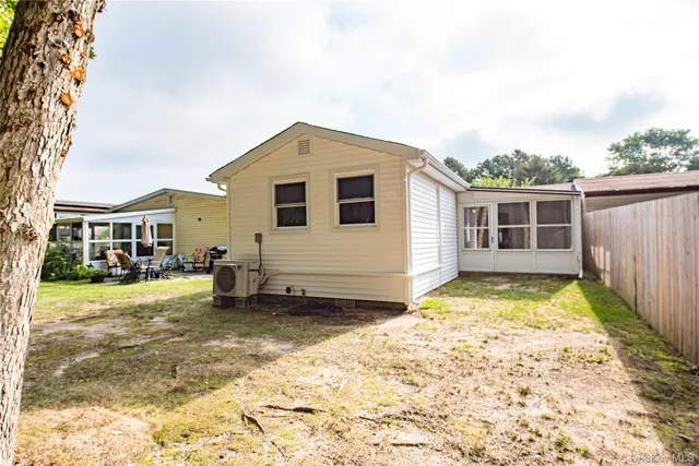 a view of a back yard of the house