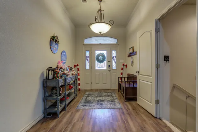 a bathroom with a tub and a view of bathroom