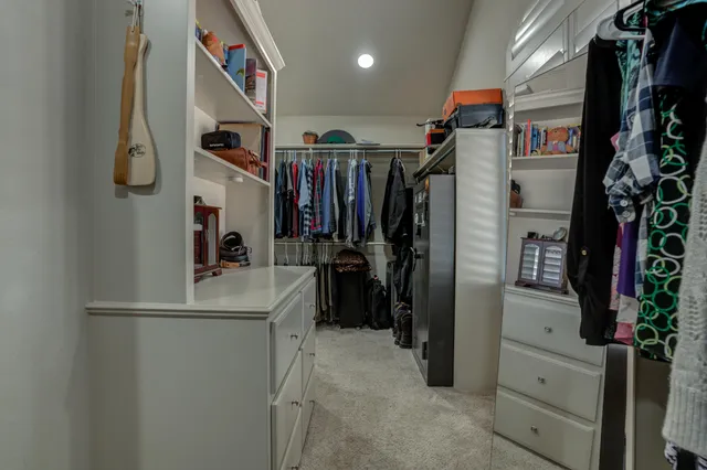 a view of a house with backyard and porch