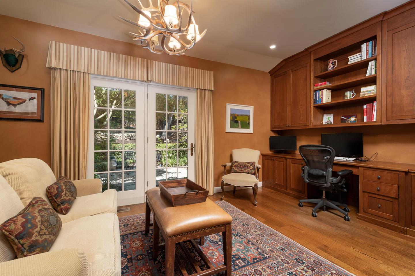 1055 Vista Road Hillsborough, CA 94010 - Photo 12 of 28 a livingroom with workspace couch and a window