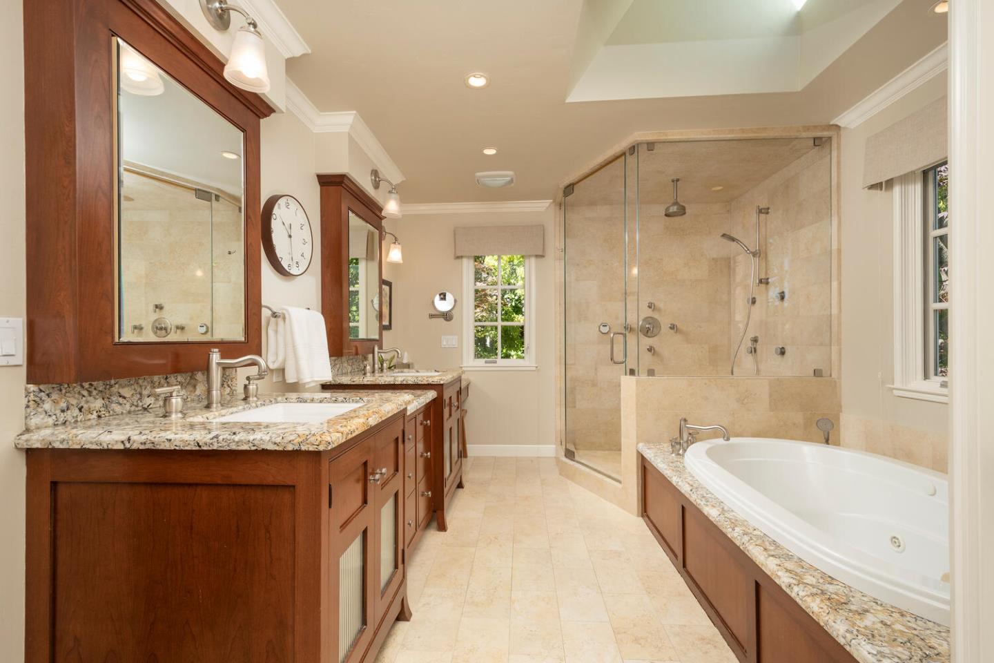 1055 Vista Road Hillsborough, CA 94010 - Photo 15 of 28 a spacious bathroom with a granite countertop tub sink shower and mirror