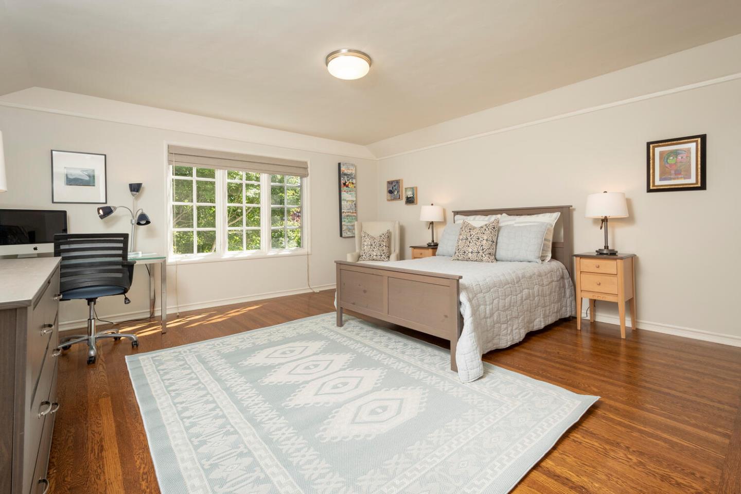 1055 Vista Road Hillsborough, CA 94010 - Photo 19 of 28 a bed room with a bed and a chair