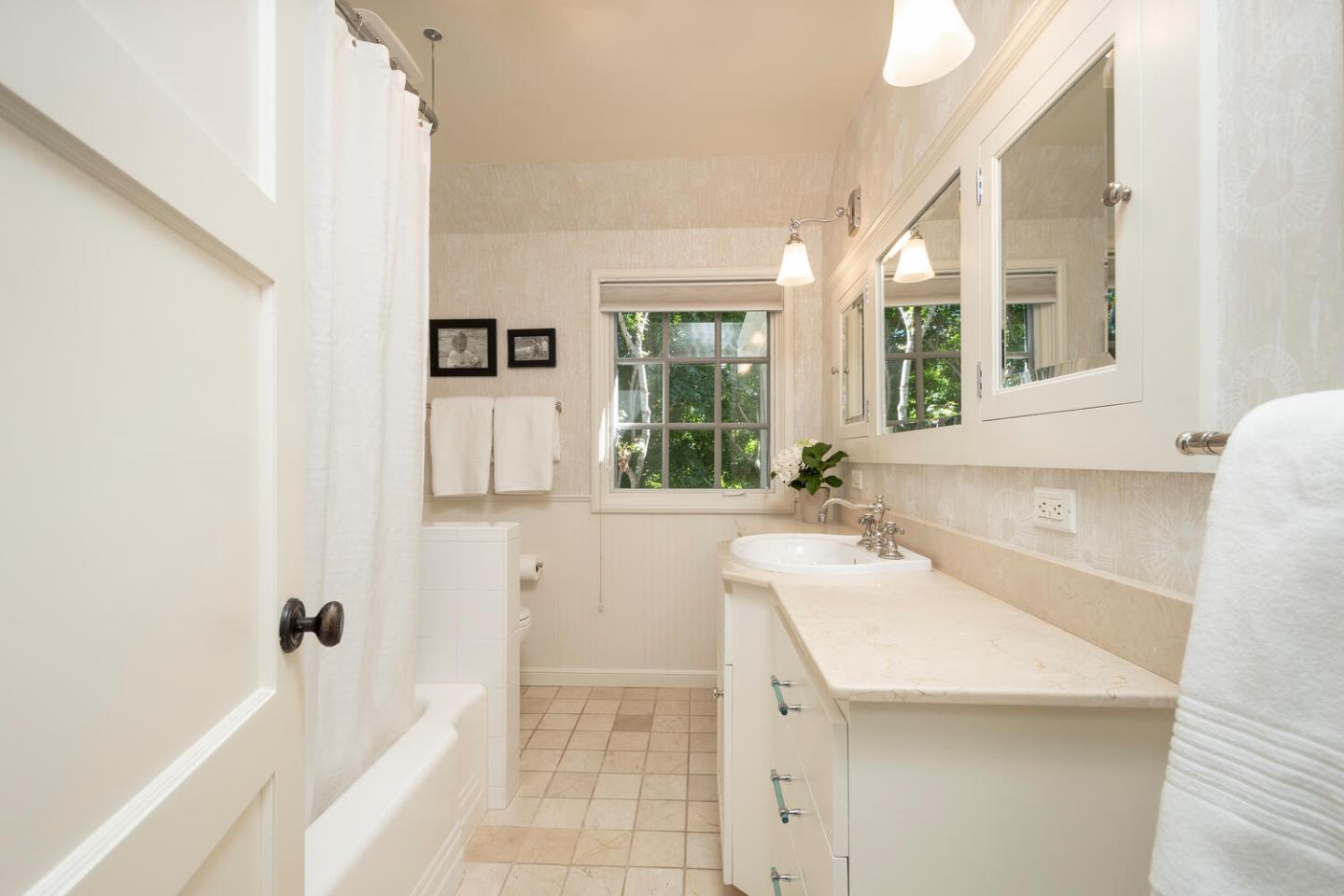 1055 Vista Road Hillsborough, CA 94010 - Photo 20 of 28 a bathroom with a sink and a bathtub