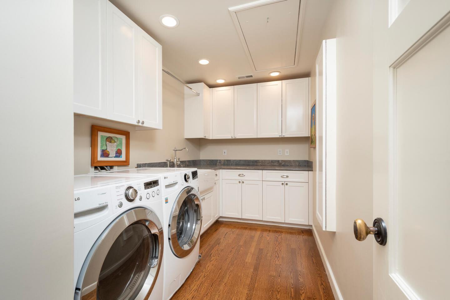 1055 Vista Road Hillsborough, CA 94010 - Photo 21 of 28 a view of a kitchen with washer and dryer