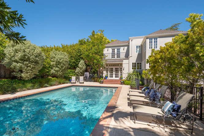1055 Vista Road Hillsborough, CA 94010 - Photo 22 of 28 a view of a house with a yard