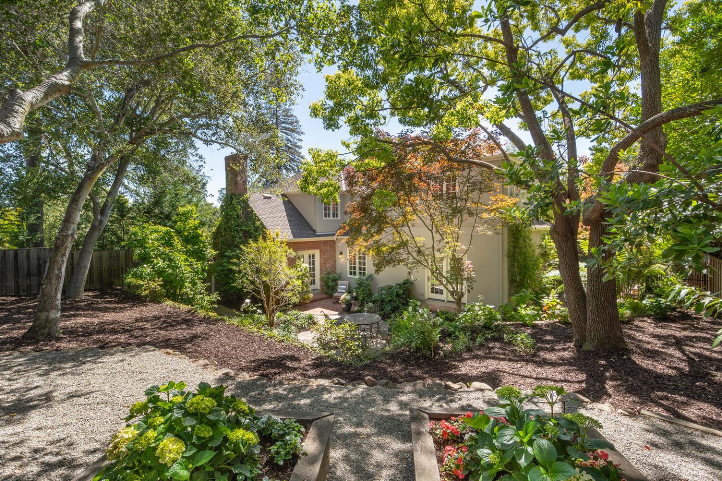 1055 Vista Road Hillsborough, CA 94010 - Photo 25 of 28 a front view of a house with a yard