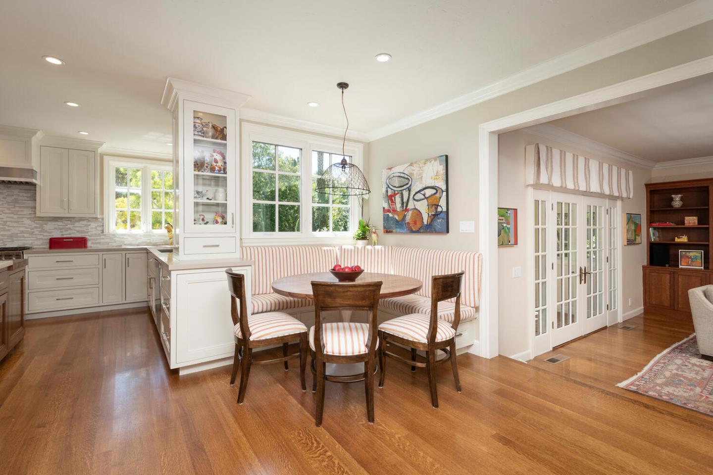 1055 Vista Road Hillsborough, CA 94010 - Photo 9 of 28 a view of a dining room with furniture and a window