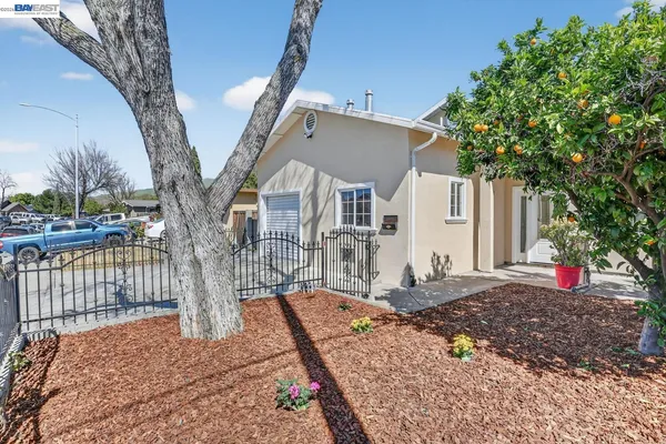 a house with trees in front of it