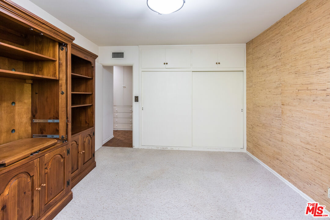 642 Elkins Road Los Angeles, CA 90049 - Photo 21 of 31 a view of a walk in closet