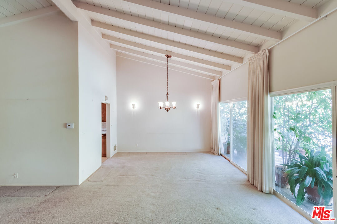 642 Elkins Road Los Angeles, CA 90049 - Photo 6 of 31 a view of a room with a porch
