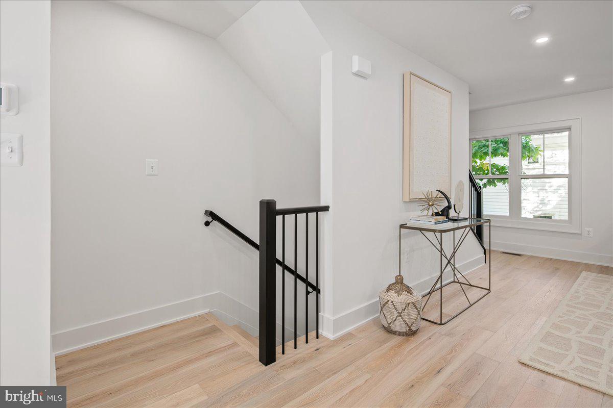 909 North Irving Street Arlington, VA 22201 - Photo 18 of 69 a view of entryway with wooden floor