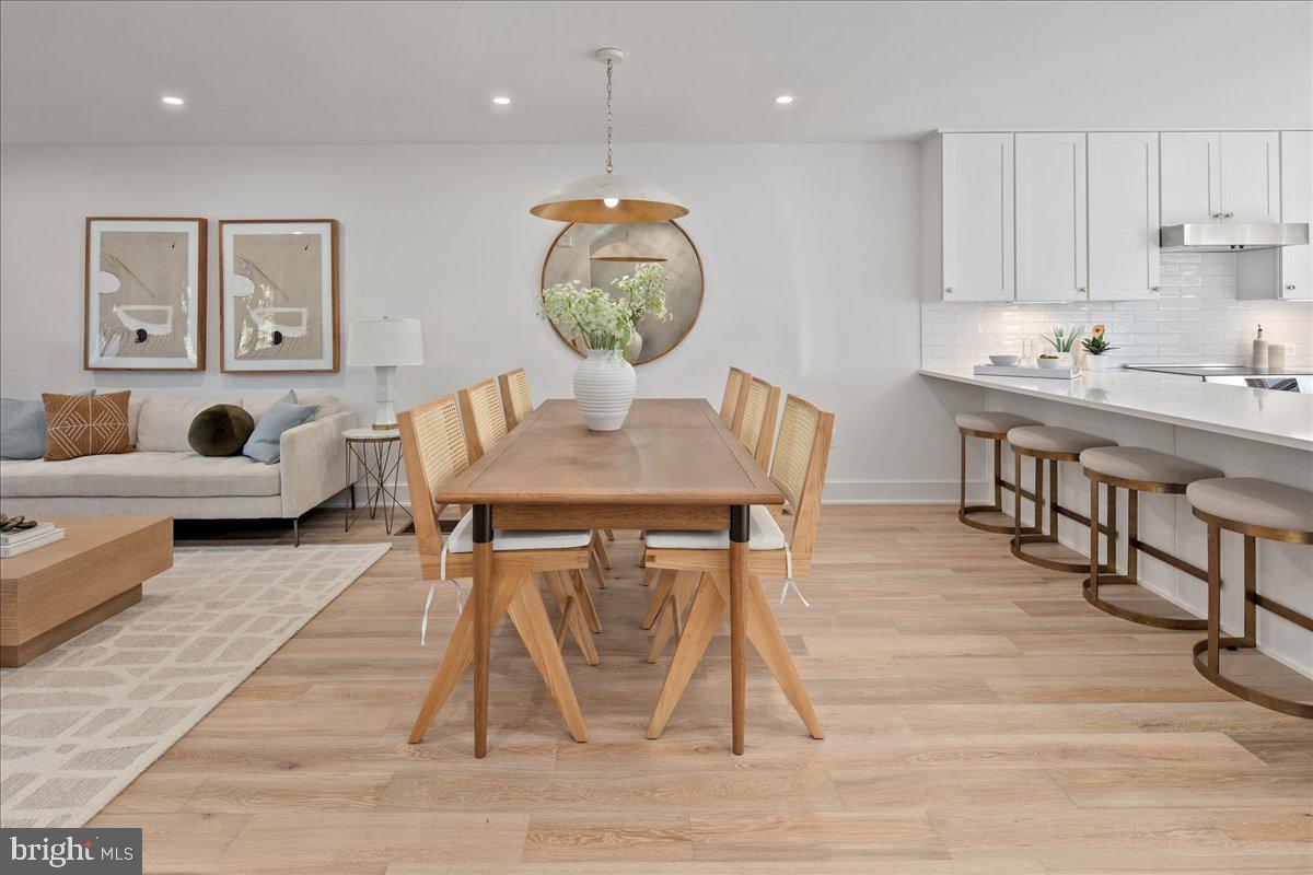 909 North Irving Street Arlington, VA 22201 - Photo 19 of 69 a view of a dining room with furniture and wooden floor