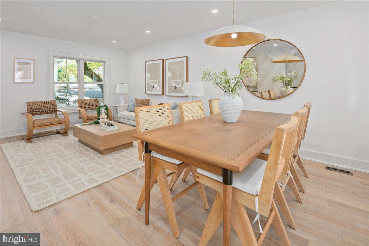 909 North Irving Street Arlington, VA 22201 - Photo 22 of 69 a view of a dining room with furniture window and wooden floor