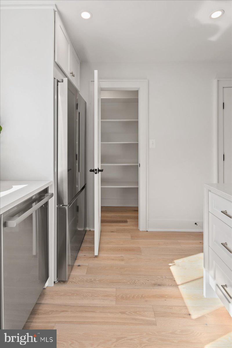 909 North Irving Street Arlington, VA 22201 - Photo 31 of 69 a view of a walk in closet