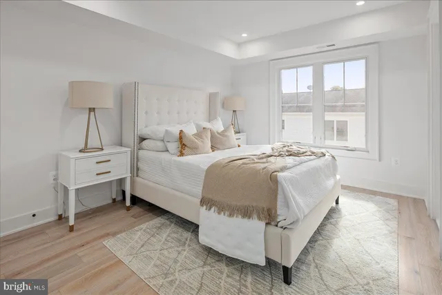 a bedroom with a bed and a cabinets