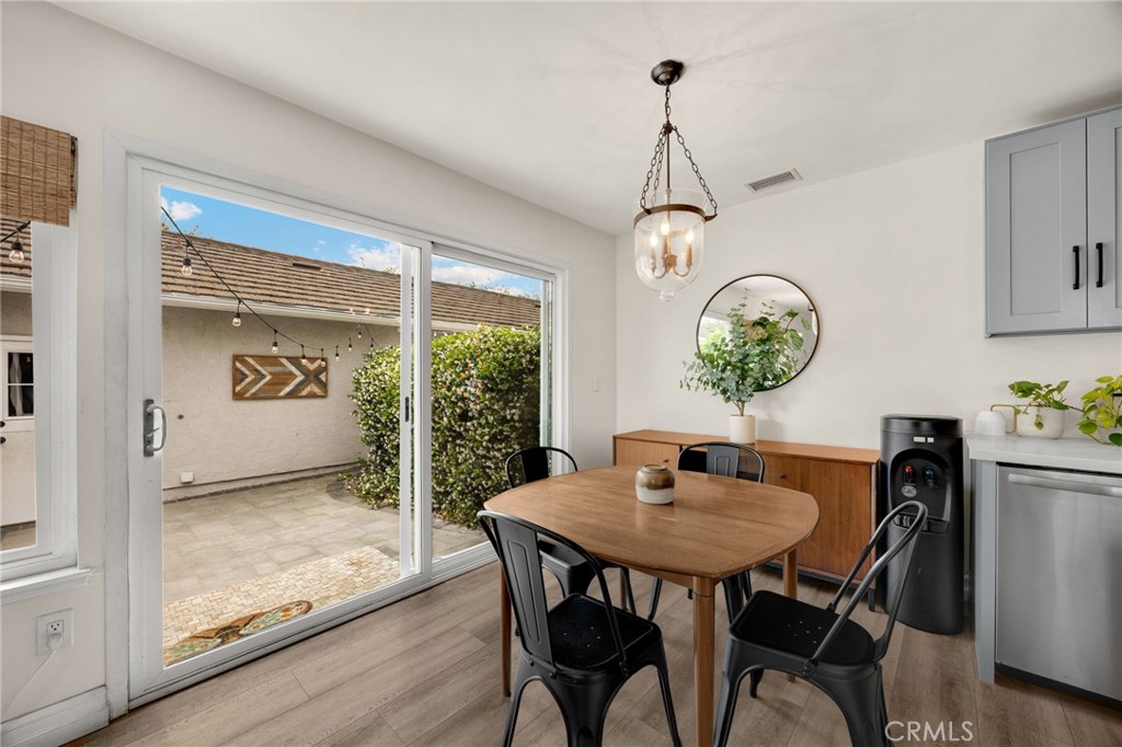 621 Seneca Street Placentia, CA 92870 - Photo 12 of 29 a view of a dining room with furniture window and wooden floor
