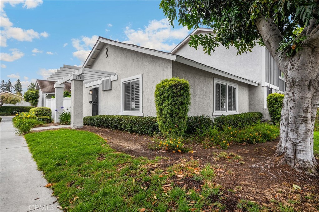 621 Seneca Street Placentia, CA 92870 - Photo 2 of 29 a front view of a house with garden