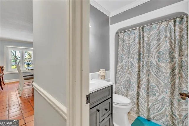 an aerial view of a house with a garden