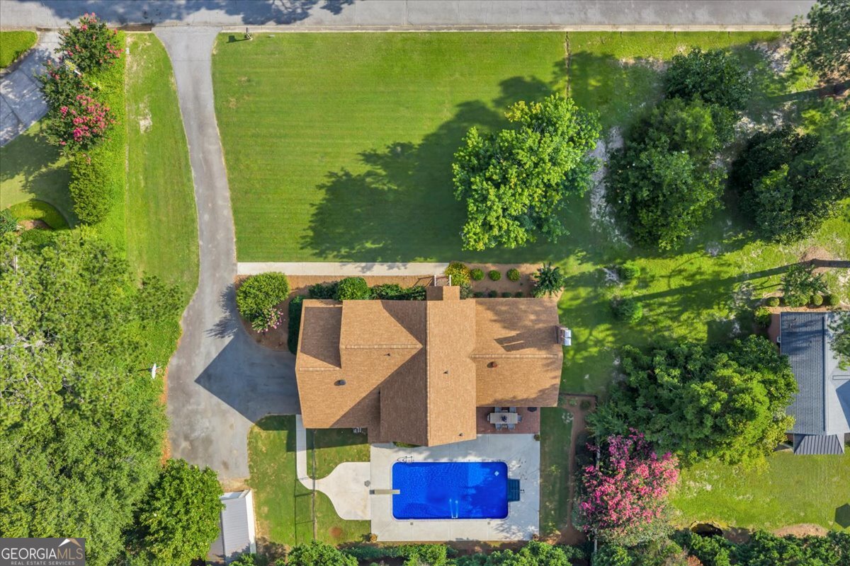 1808 Ross Street Perry, GA 31069 - Photo 44 of 56 an aerial view of a house with a garden