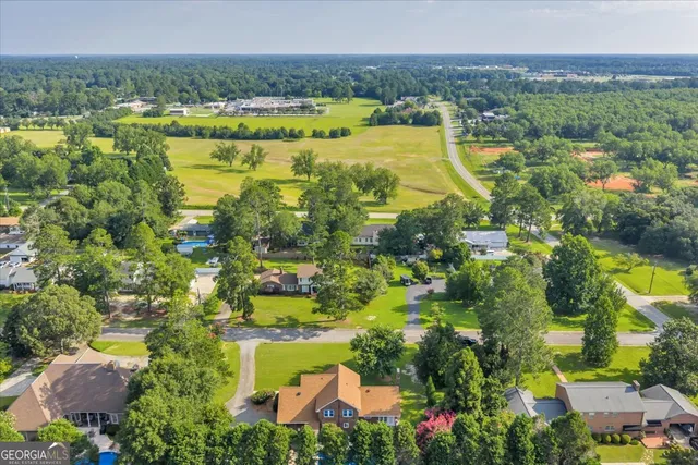 a view of a house with a big yard