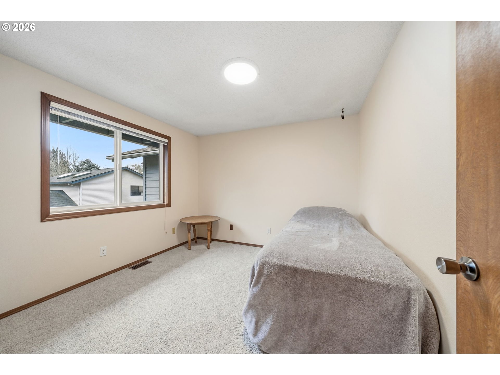 13825 Southwest Weir Road Beaverton, OR 97008 - Photo 21 of 40 a view of a hallway with front door
