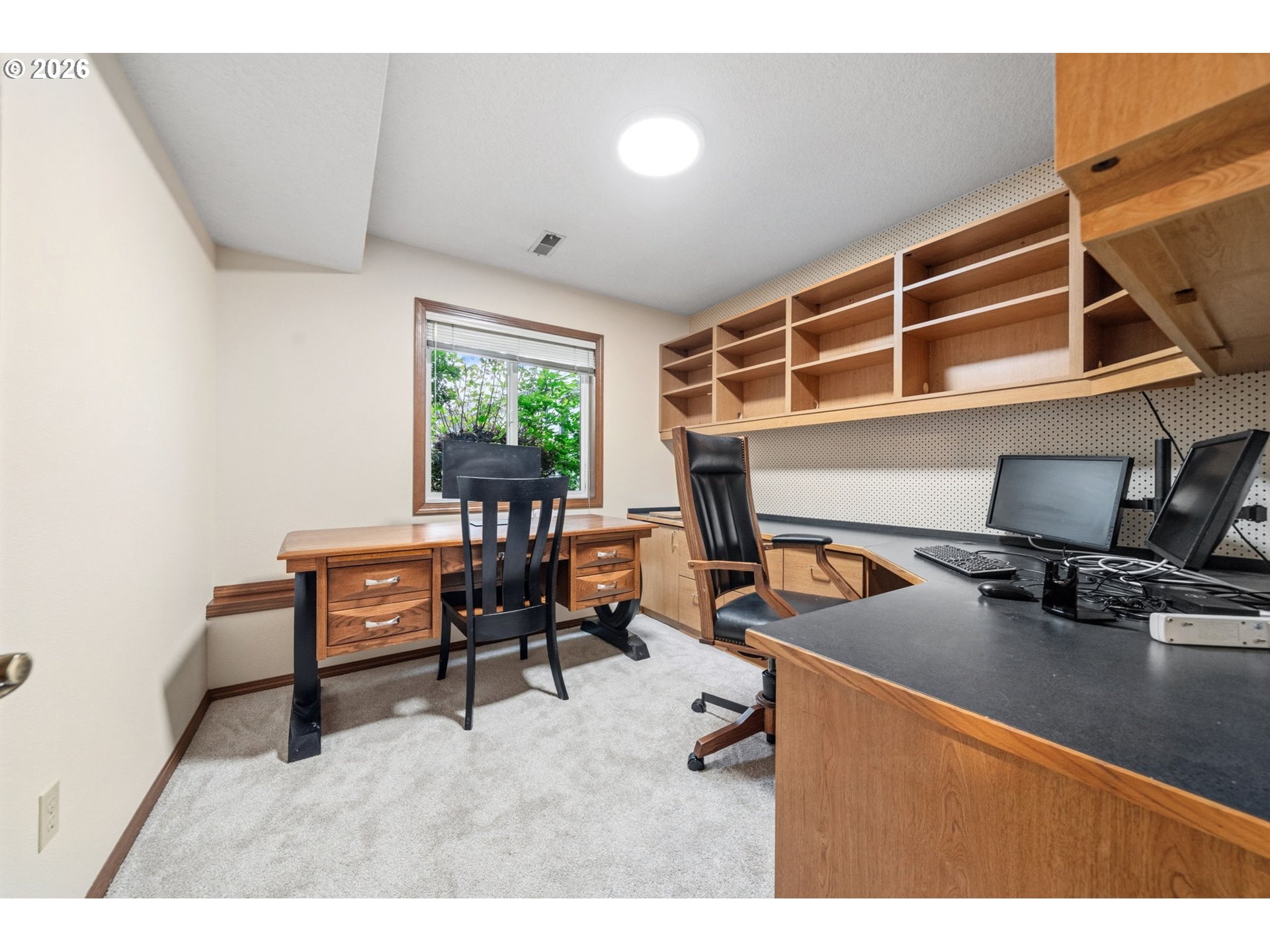 13825 Southwest Weir Road Beaverton, OR 97008 - Photo 27 of 40 a living room with furniture and a large window