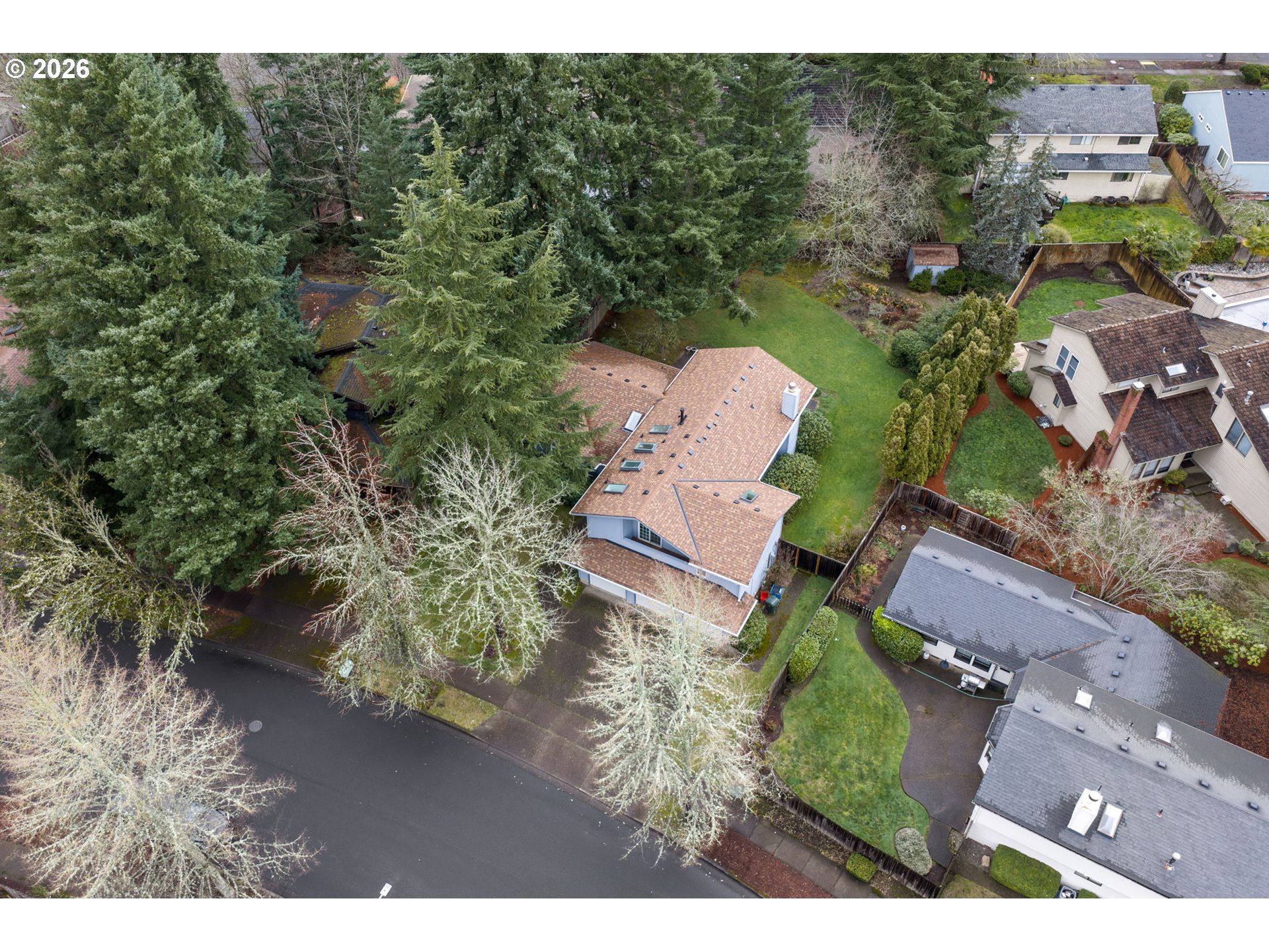 13825 Southwest Weir Road Beaverton, OR 97008 - Photo 33 of 40 an aerial view of a house with a yard