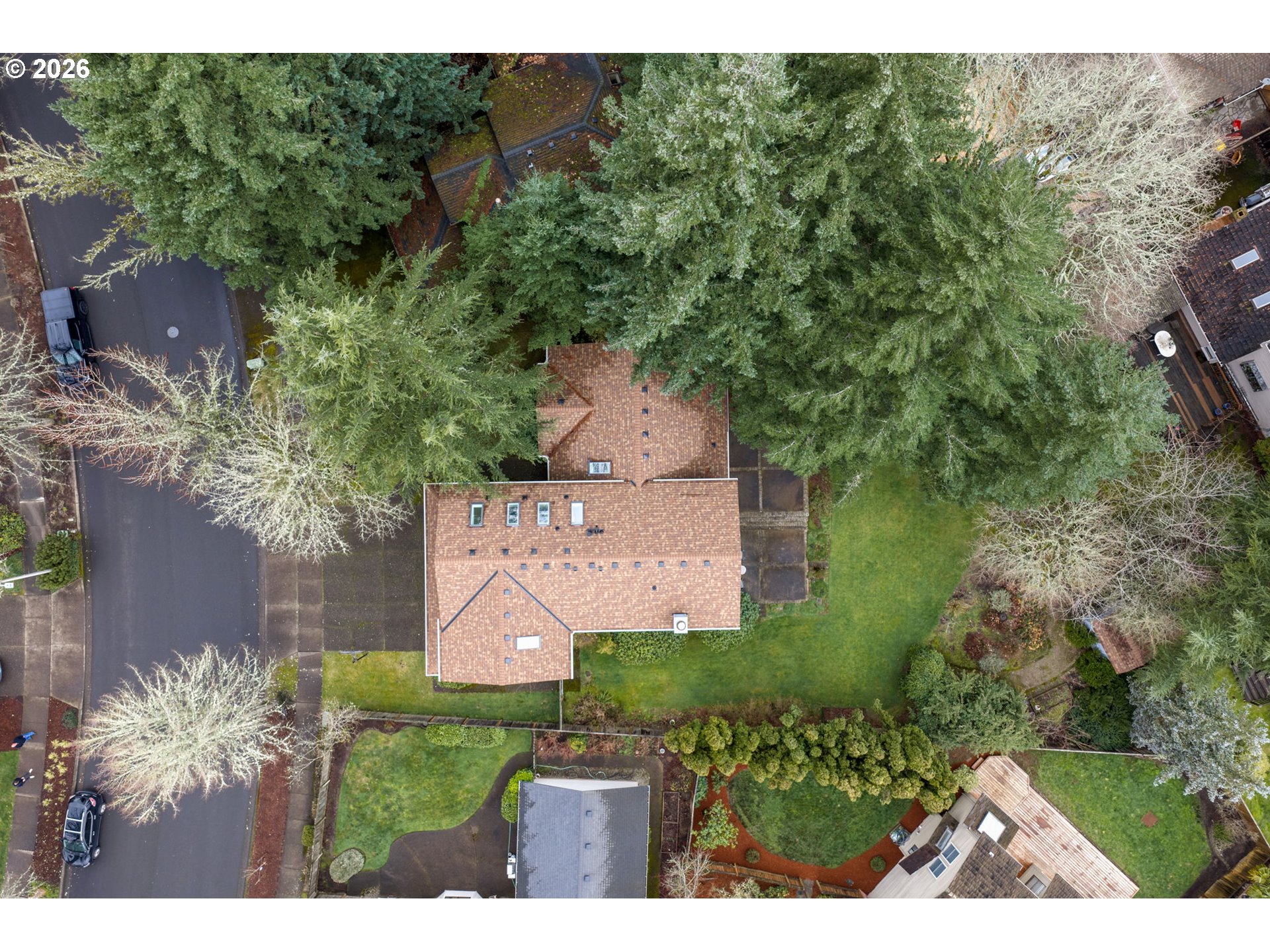 13825 Southwest Weir Road Beaverton, OR 97008 - Photo 34 of 40 an aerial view of a house with garden space and a street view