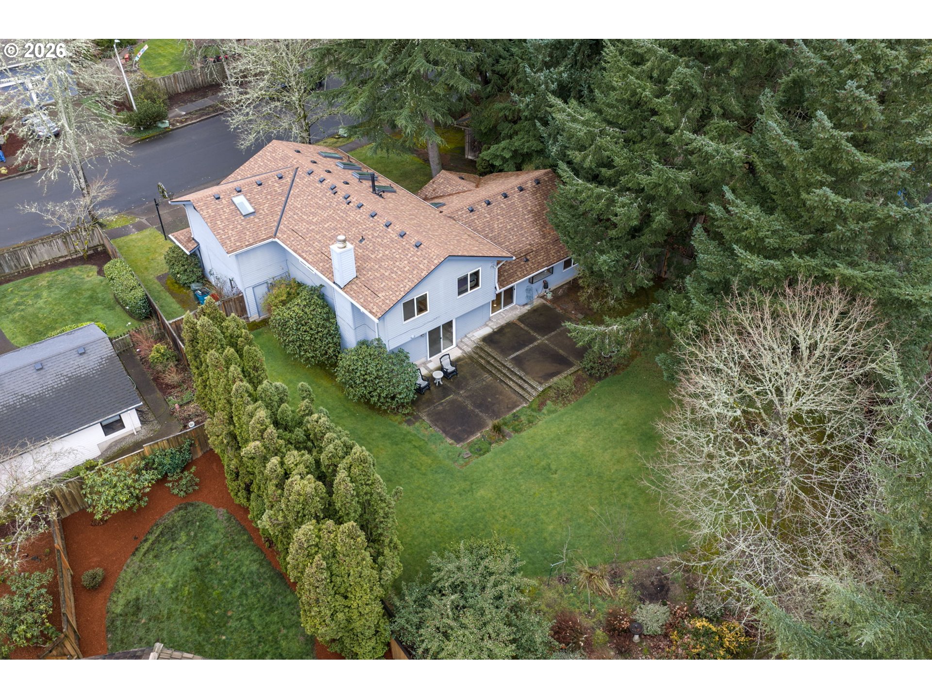 13825 Southwest Weir Road Beaverton, OR 97008 - Photo 35 of 40 an aerial view of a house with a yard