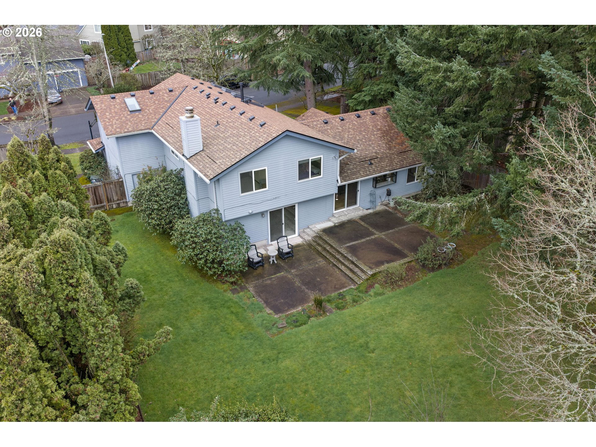 13825 Southwest Weir Road Beaverton, OR 97008 - Photo 36 of 40 a aerial view of a house next to a big yard