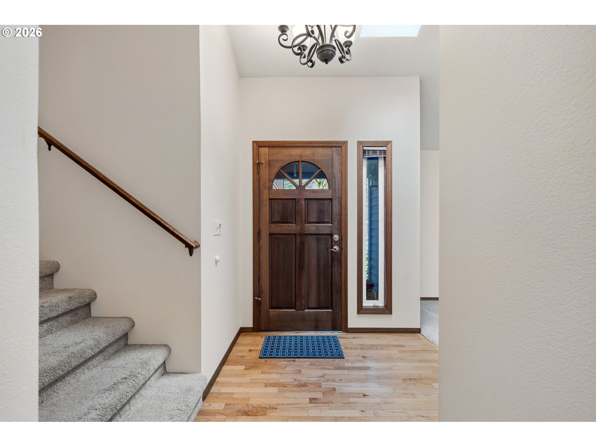 13825 Southwest Weir Road Beaverton, OR 97008 - Photo 4 of 40 a view of entryway with wooden floor