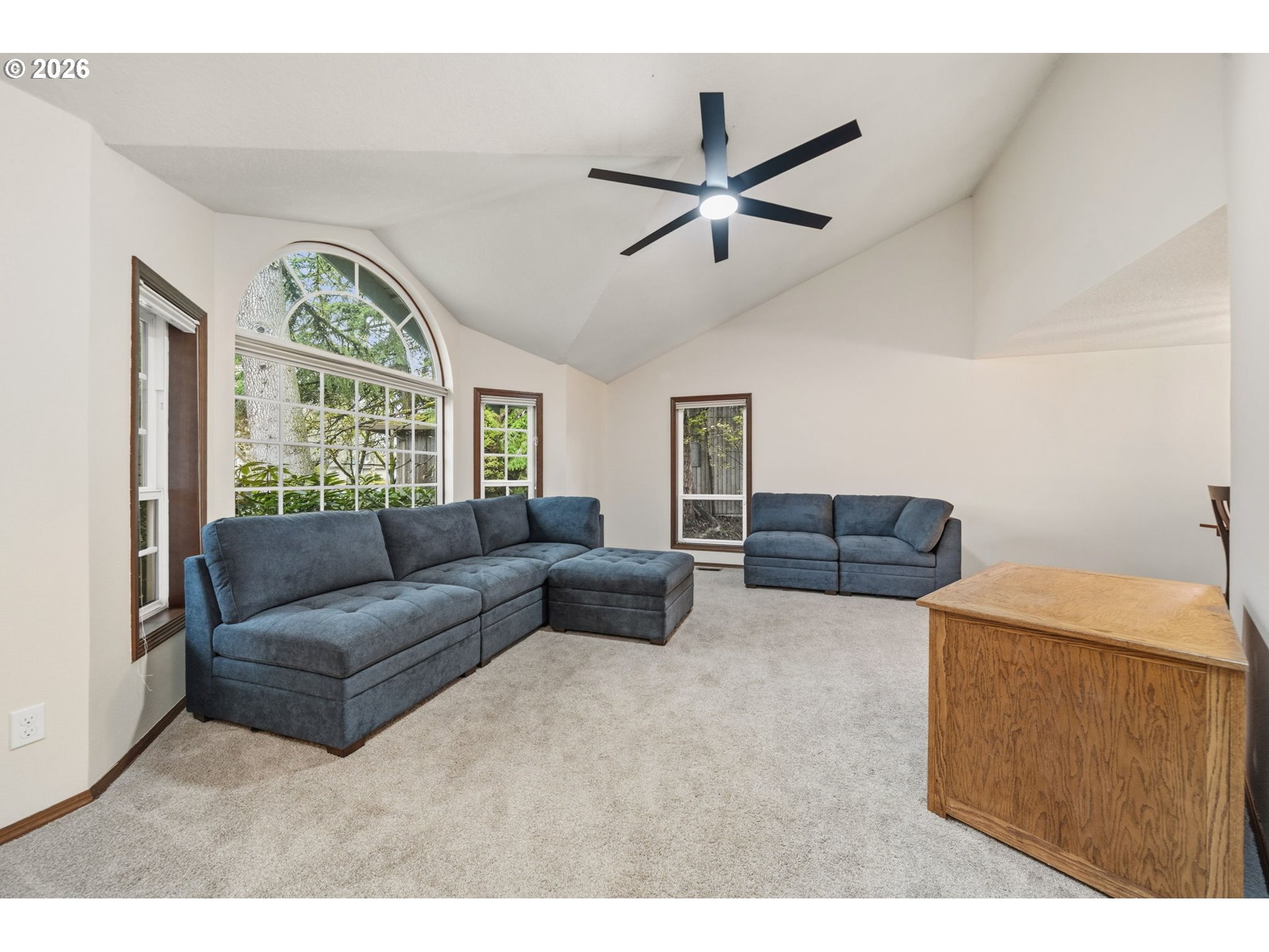 13825 Southwest Weir Road Beaverton, OR 97008 - Photo 5 of 40 a living room with furniture and a large window