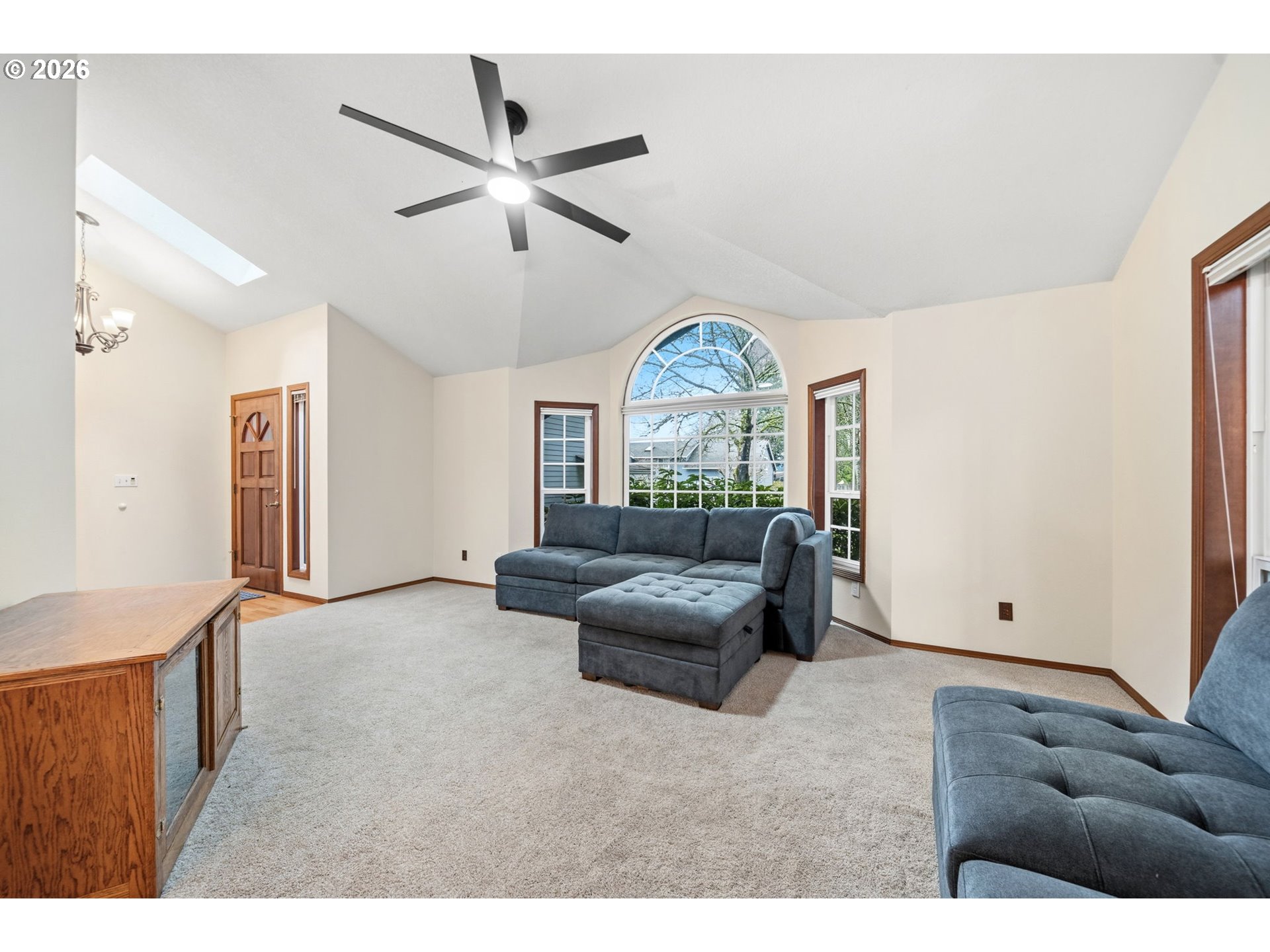 13825 Southwest Weir Road Beaverton, OR 97008 - Photo 7 of 40 a living room with furniture and a large window