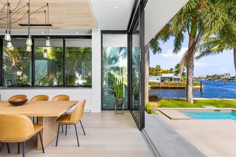 a view of a swimming pool with a lounge chairs