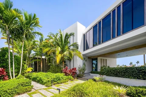 a view of a house with a swimming pool