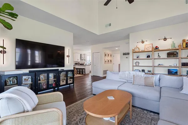 a view of a livingroom with furniture and window