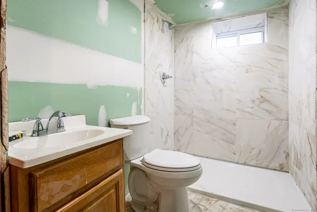 a view of a balcony with wooden floor
