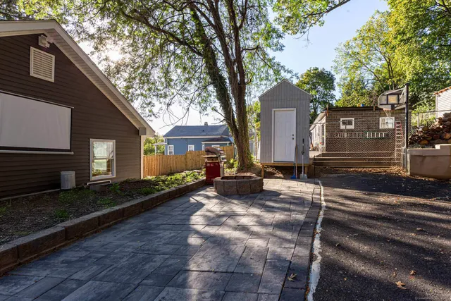 a front view of a house with yard