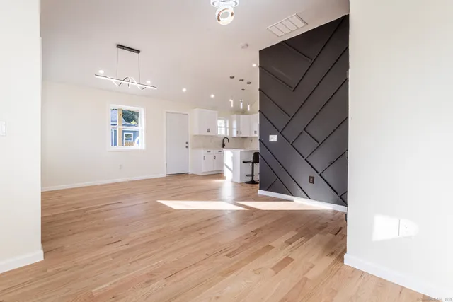 a view of kitchen with wooden floor