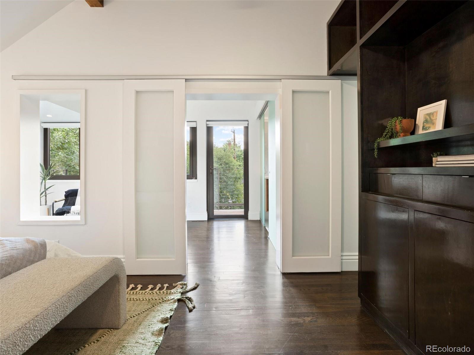 1253 Elizabeth Street Denver, CO 80206 - Photo 23 of 49 a view of hallway with livingroom and furniture