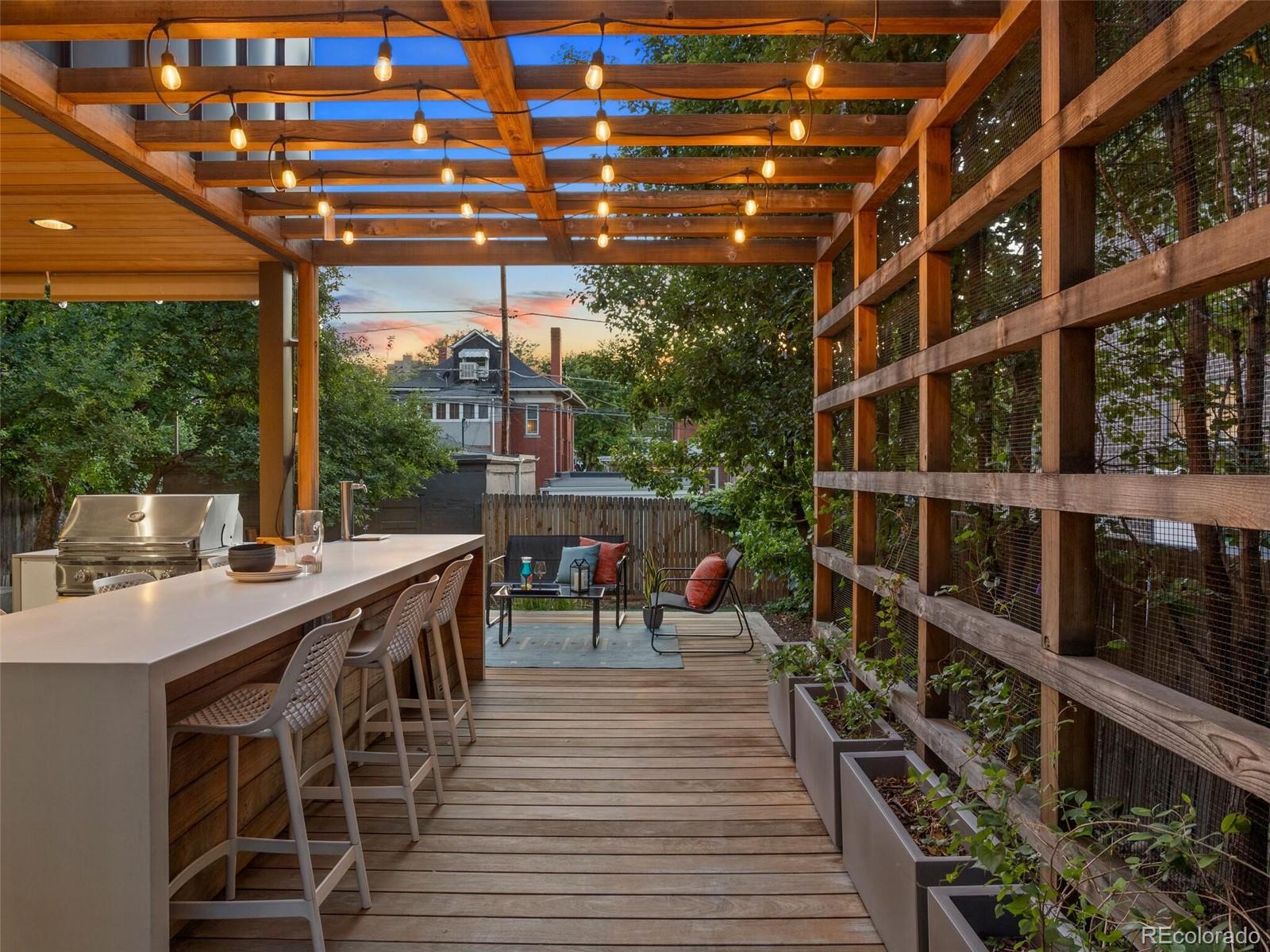 1253 Elizabeth Street Denver, CO 80206 - Photo 47 of 49 a view of a balcony with chairs