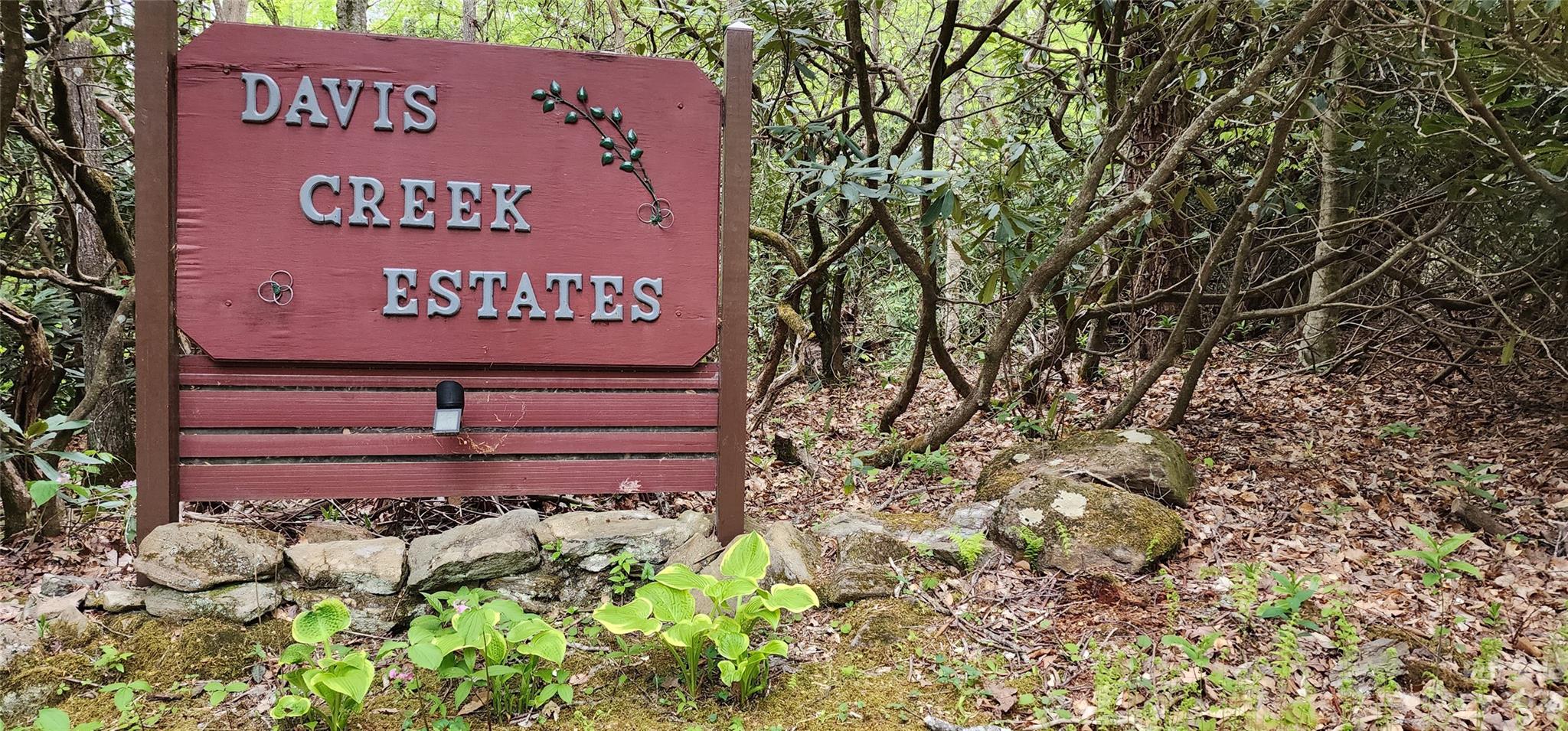 79 Apgar Road Candler, NC 28715 - Photo 16 of 17 a sign on the side of a road