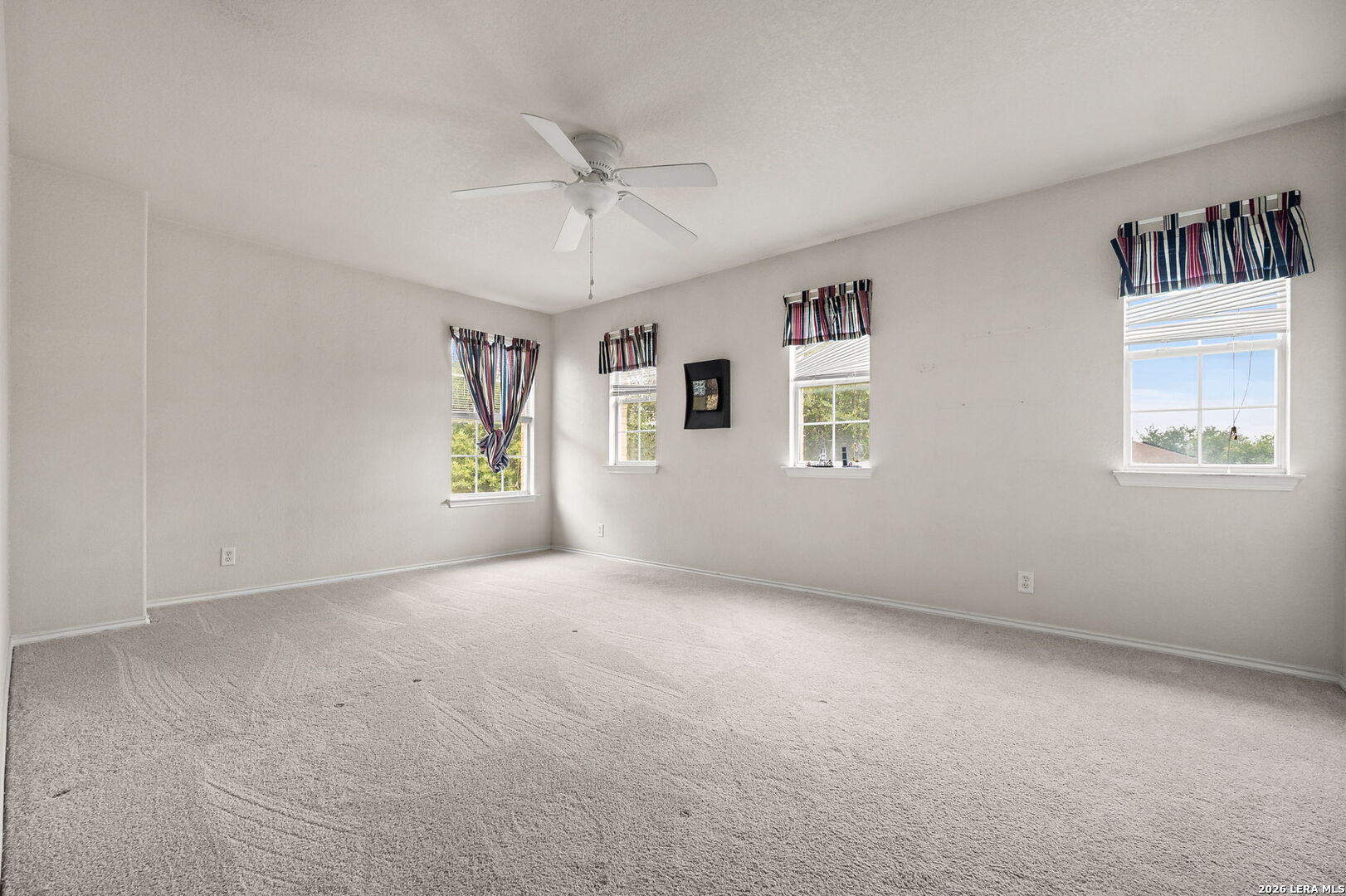 7207 Avery Road Live Oak, TX 78233 - Photo 21 of 32 a view of an empty room with a window