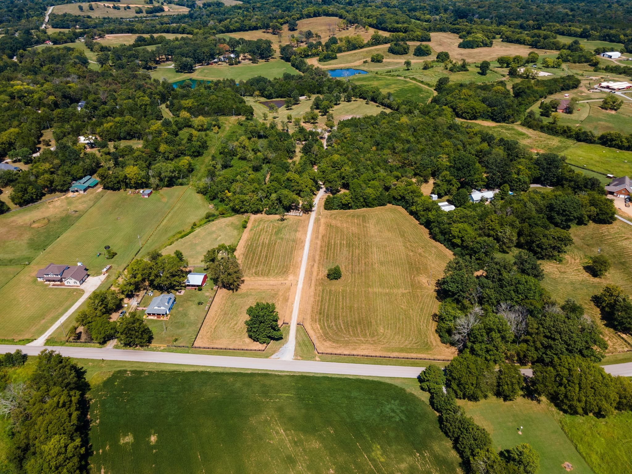 8362 Patterson Road College Grove, TN 37046 - Photo 2 of 27 an aerial view of residential house with outdoor space and swimming pool