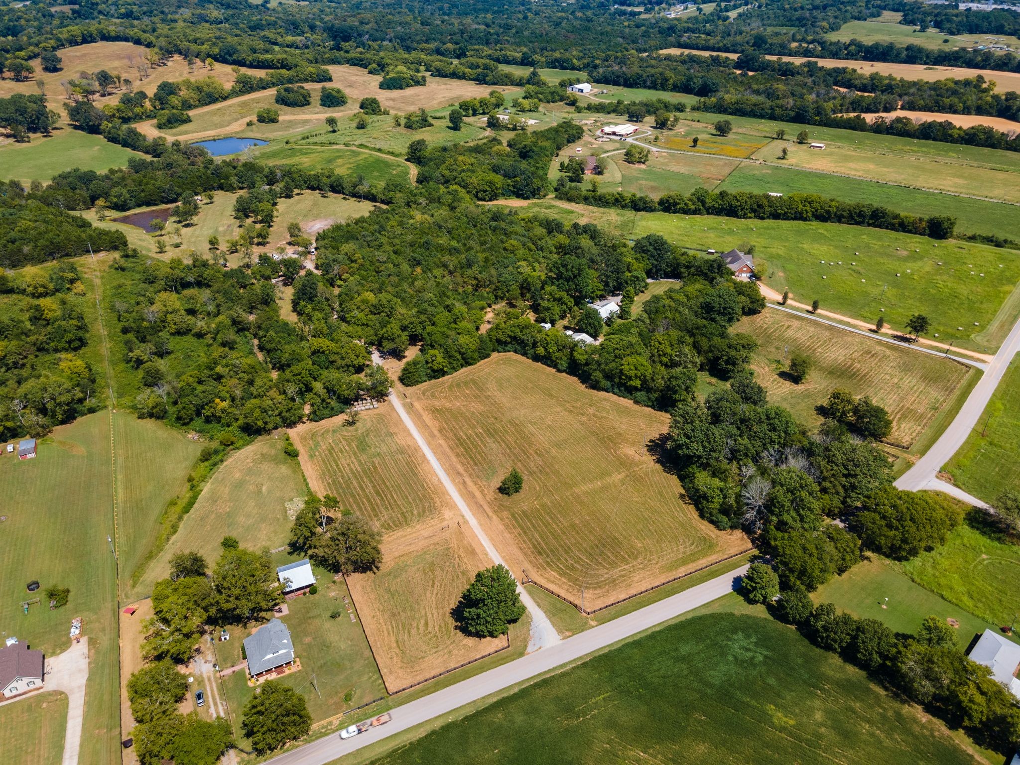 8362 Patterson Road College Grove, TN 37046 - Photo 4 of 27 an aerial view of residential houses with outdoor space